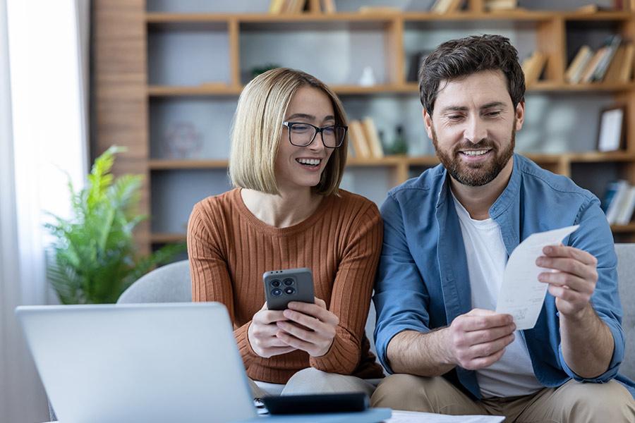 Couple reviewing personal loans